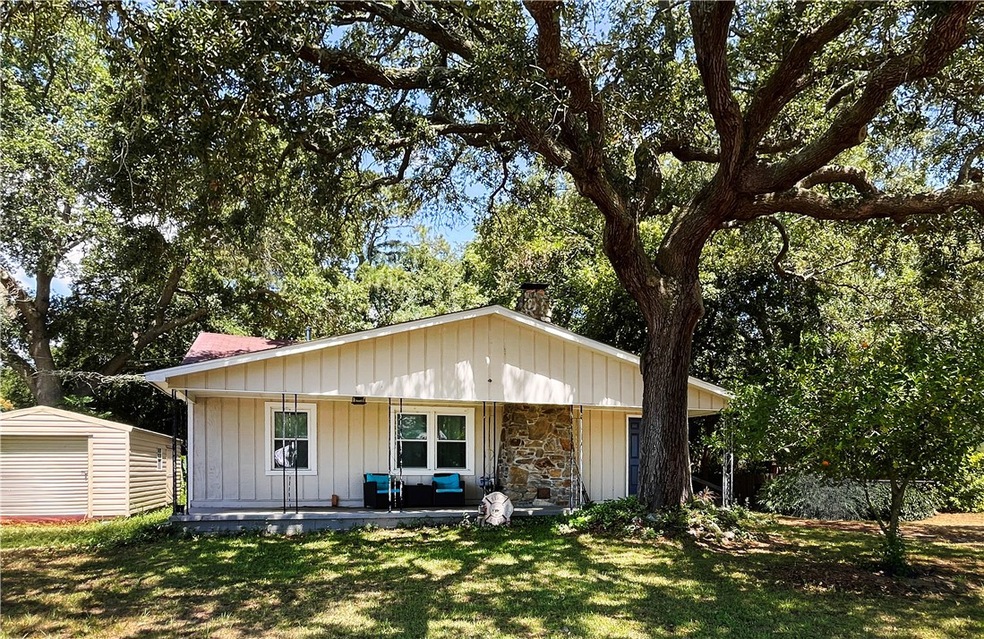 front view w beautiful trees in front and backyard