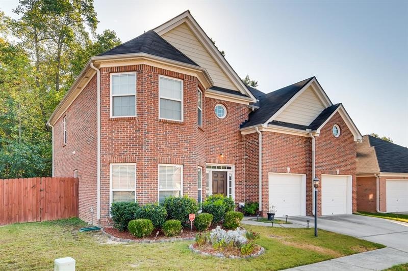 Beautiful brick home on very manageable lot!  Larg