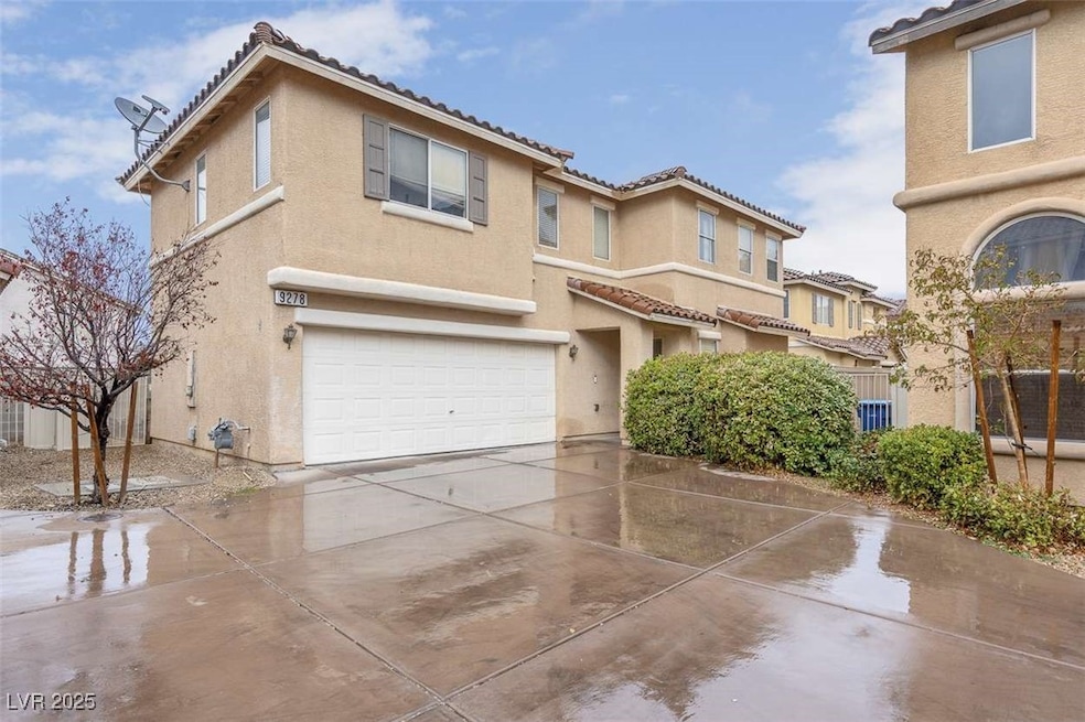 View of front of home with a garage