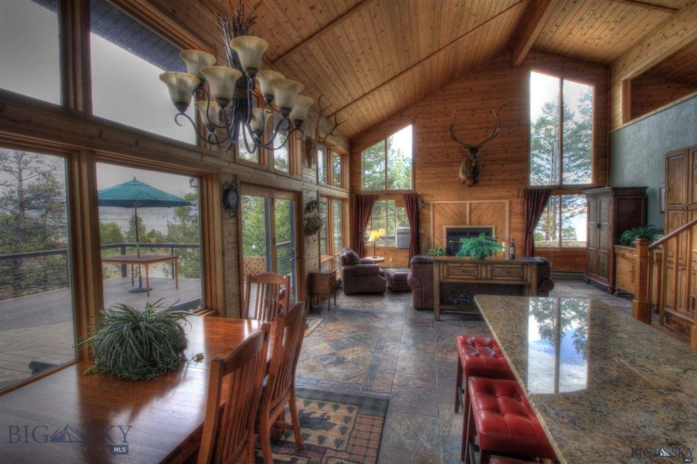 View of Family room and Lake from kitchen.