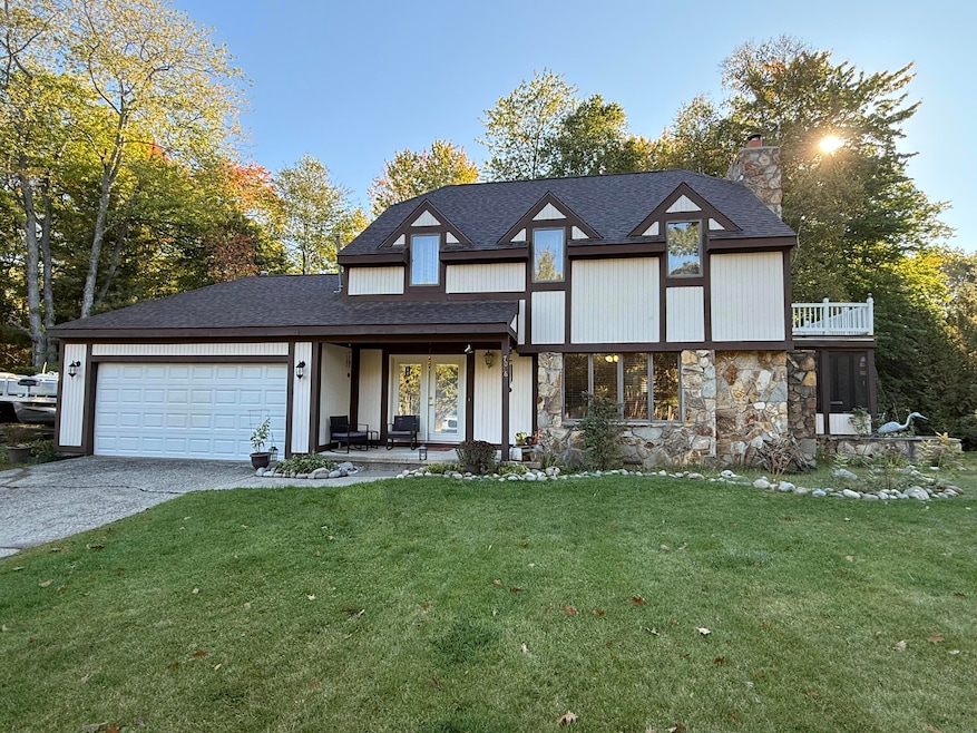 7036 Woodlea Rd W, Oscoda, MI 48750 - photo 1