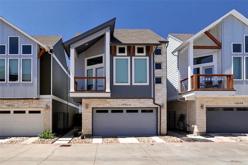 View of front of house featuring roof with shingl