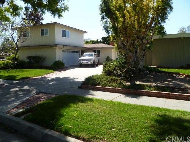 SPACIOUS HOME ON CHARMING TREE LINED STREET IN THE