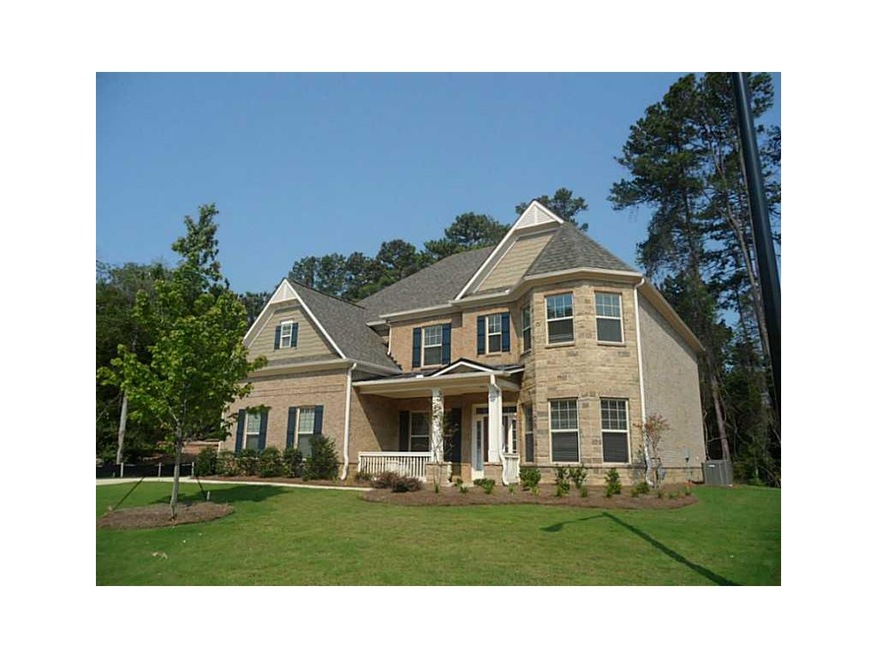 Exterior Front. The front of this 3-side brick hom