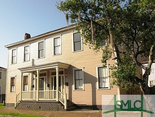 Street exterior.  The right side is the two story 