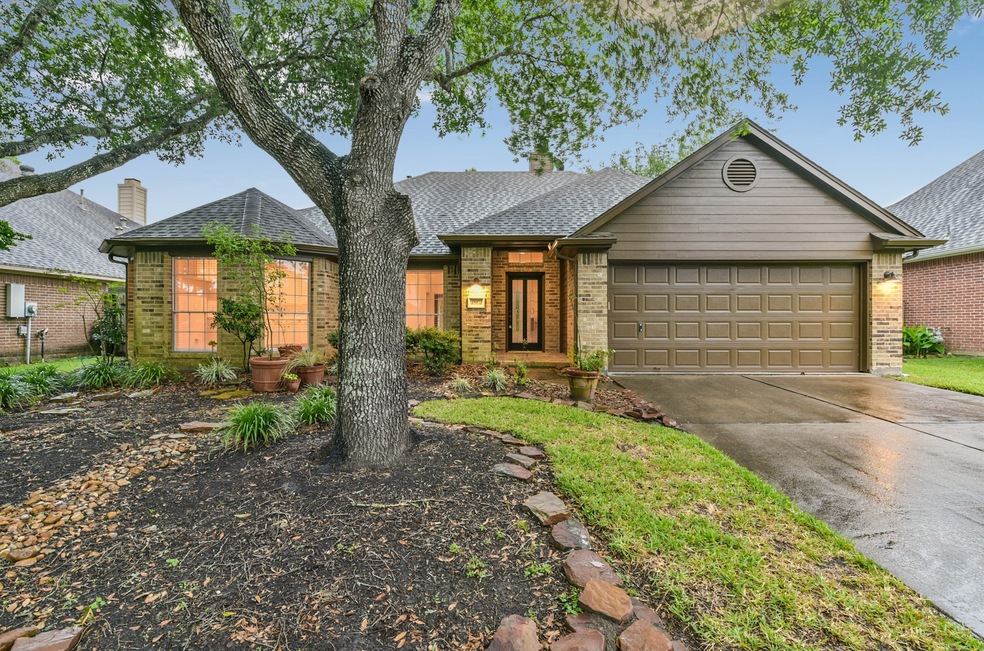 Welcome to 3803 Lake Dr—a charming one-story brick and cement board home in Sunset Lakes in Pearland, very close to Friendswood. Notice the inviting brick front porch with beautiful front door and transom over the door