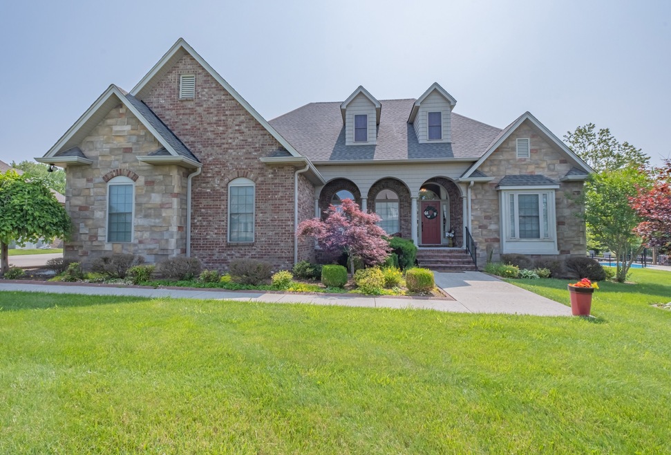 Welcome HOME! Look at the brick & stone work, the curb appeal is stunning