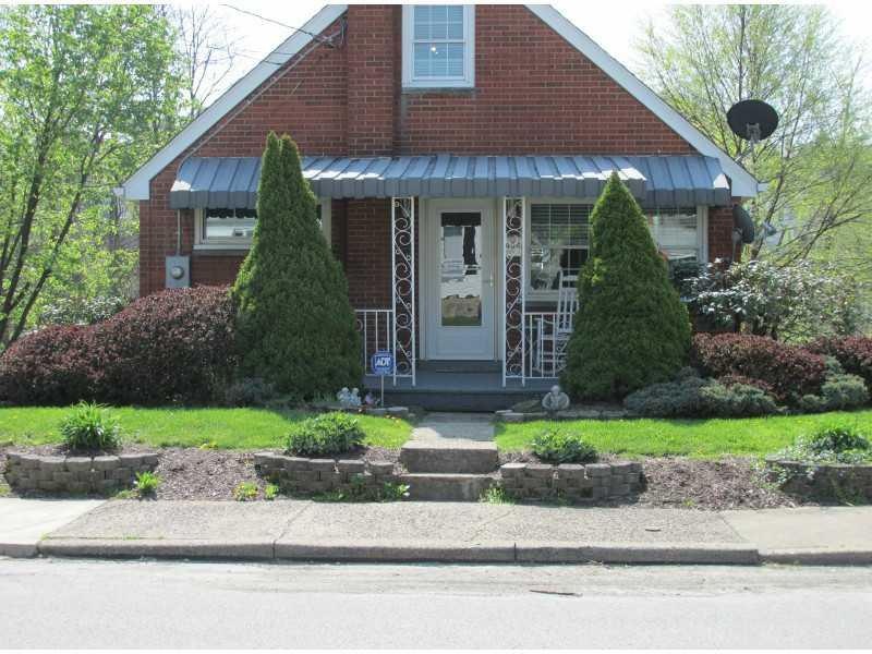 Exterior Front. Quaint home. Level entry from stre