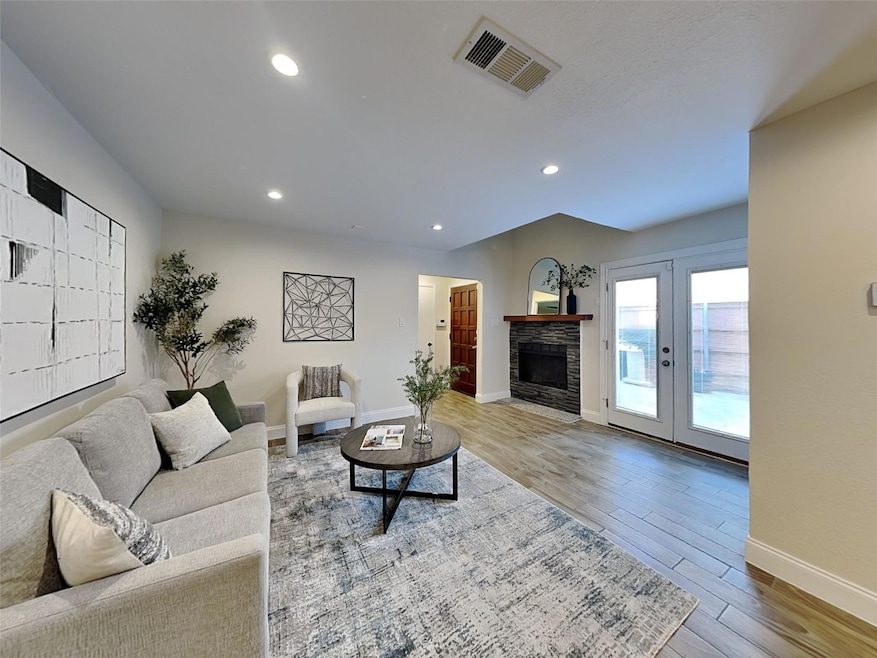 Living area featuring recessed lighting, wood fini