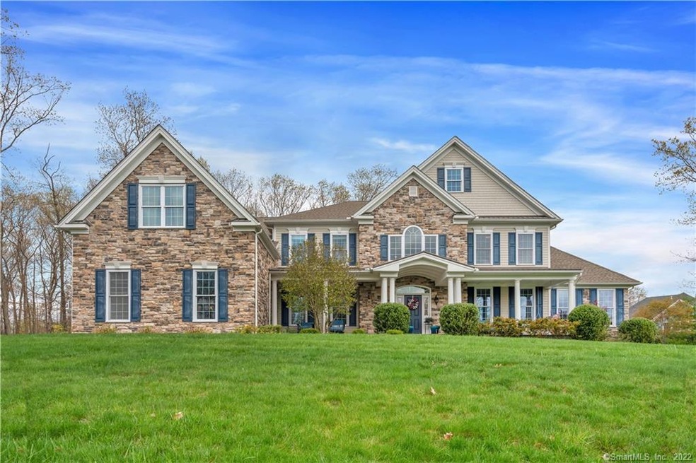 Exceptional Colonial nestled on Landscaped grounds