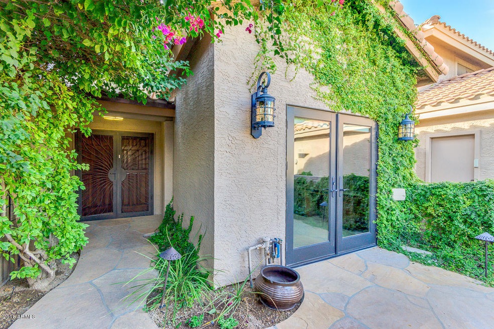 Front entry with walled courtyard