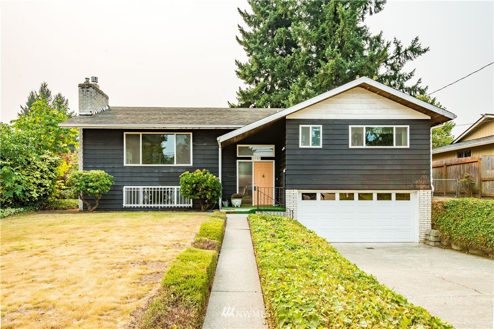 Lovely territorial views from the front main floor windows. Driveway is conveniently large. The front yard is large with mature landscaping.