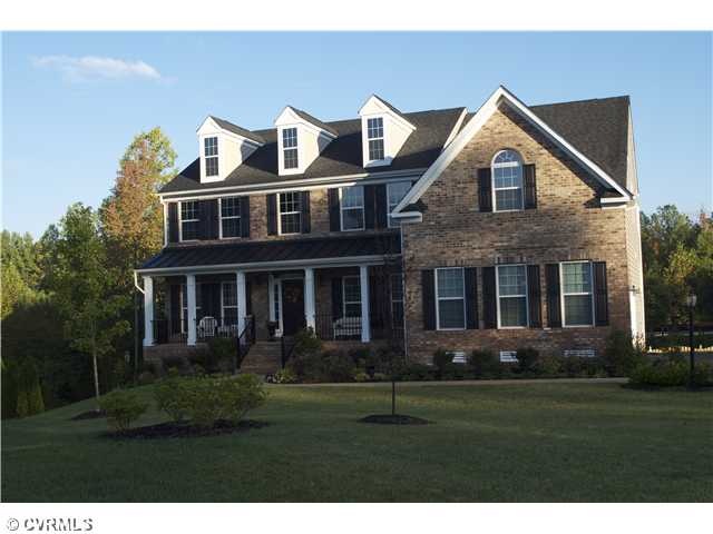 Exterior Front - Brick front home with porch, dorm