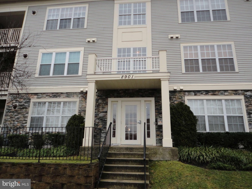 8901 Stone Creek Place unit 301, Pikesville, MD 21208 - photo 1