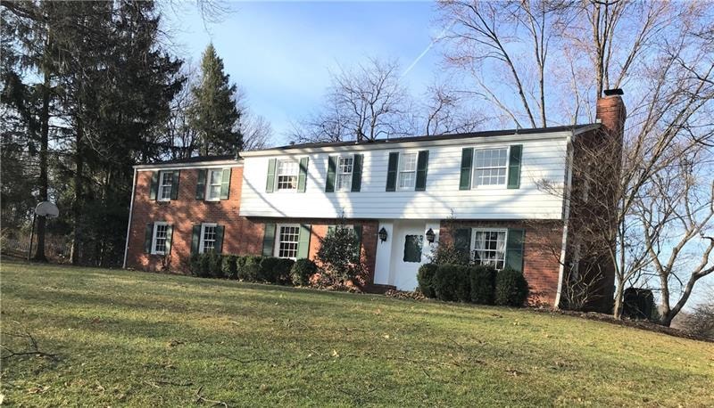 Lovely large colonial with attached garage on one 