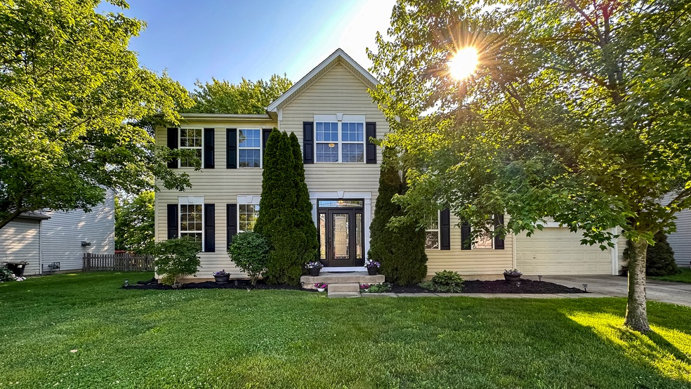 The home faces north and features a newly replace front door with window side lights plus new shutters!