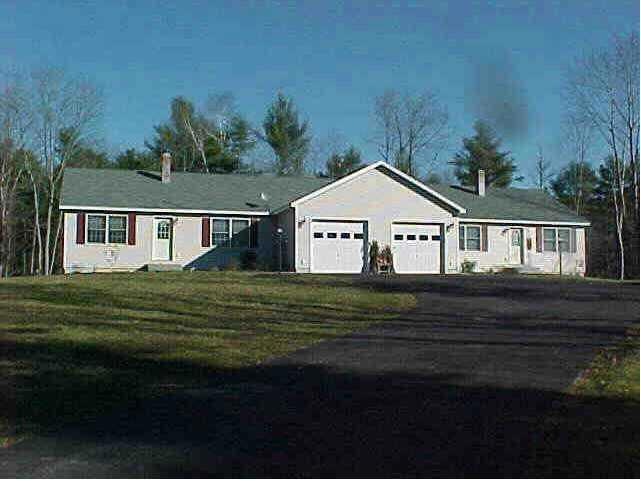 Exterior Front. Unit offered is on left