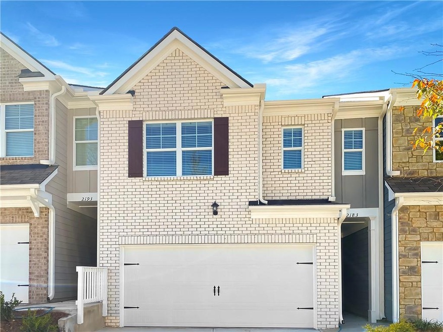 View of property with a garage