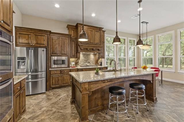 8729 Ambrosia Dr. Austin TX 78738 - Custom kitchen open to living room and both dining areas.