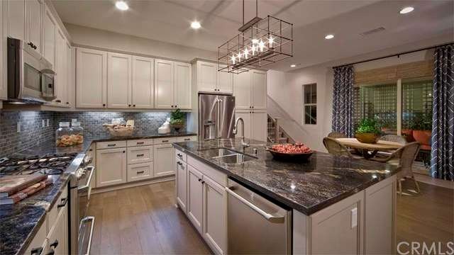 Fantastic kitchen is fully appointed, open and bri