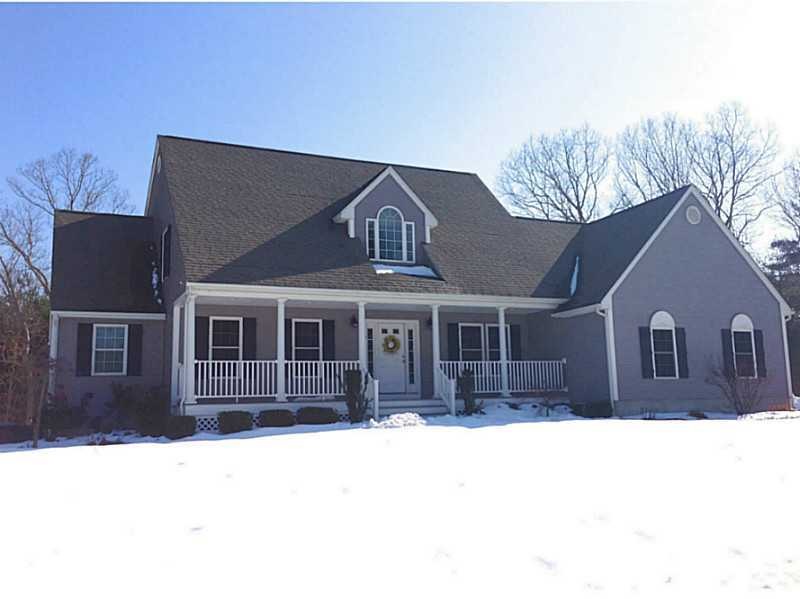 Exterior Front. Custom-built cape with every conve
