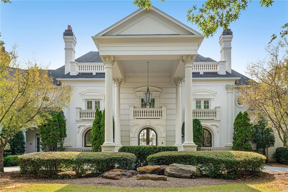 Entrance to property with a balcony