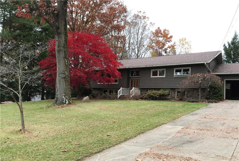 Attractive 4 Bdrm Raised Ranch home.