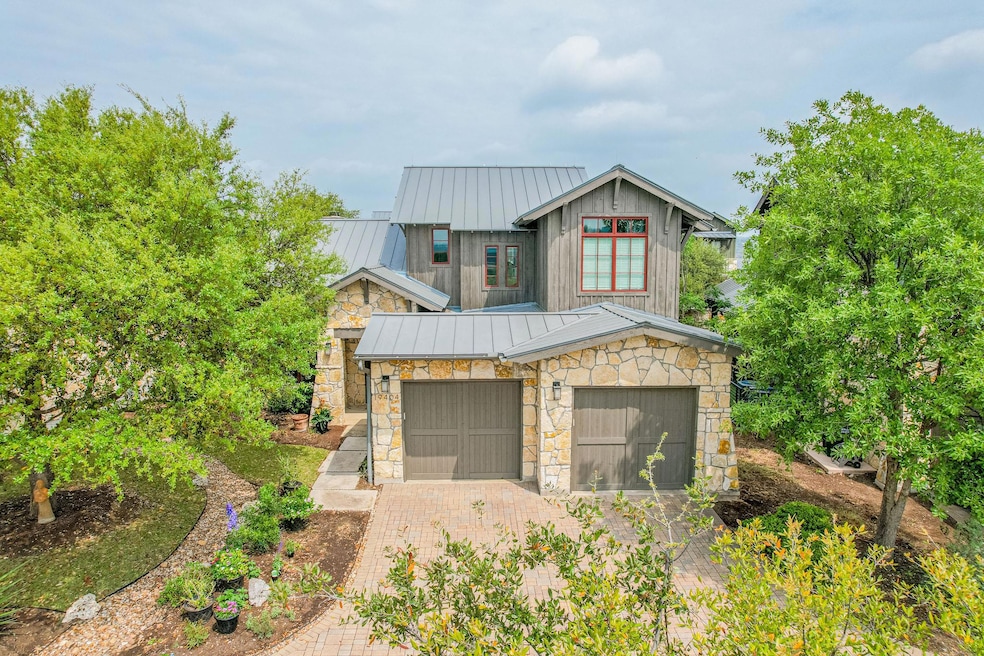 View of front of house with a standing seam roof,