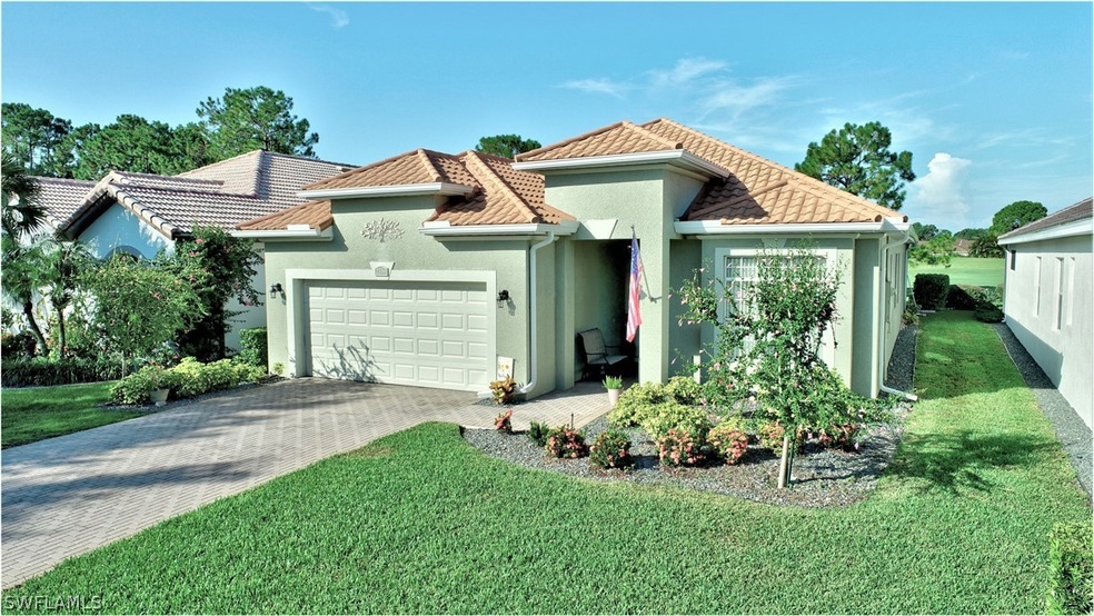 BRAND NEW metal roof, pavers in the driveway and elegant landscaping add to the beauty and charm of this Foxhall model home