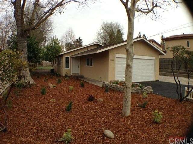 New low maintenance landscaping, new driveway and 