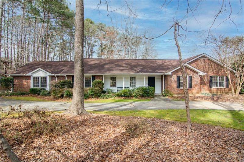 Gracious Brick Ranch style home in Peachtree Corne