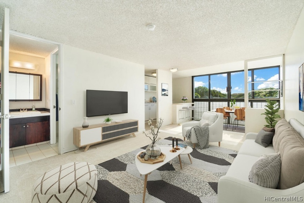 Virtually Staged.  Spacious living room with an en