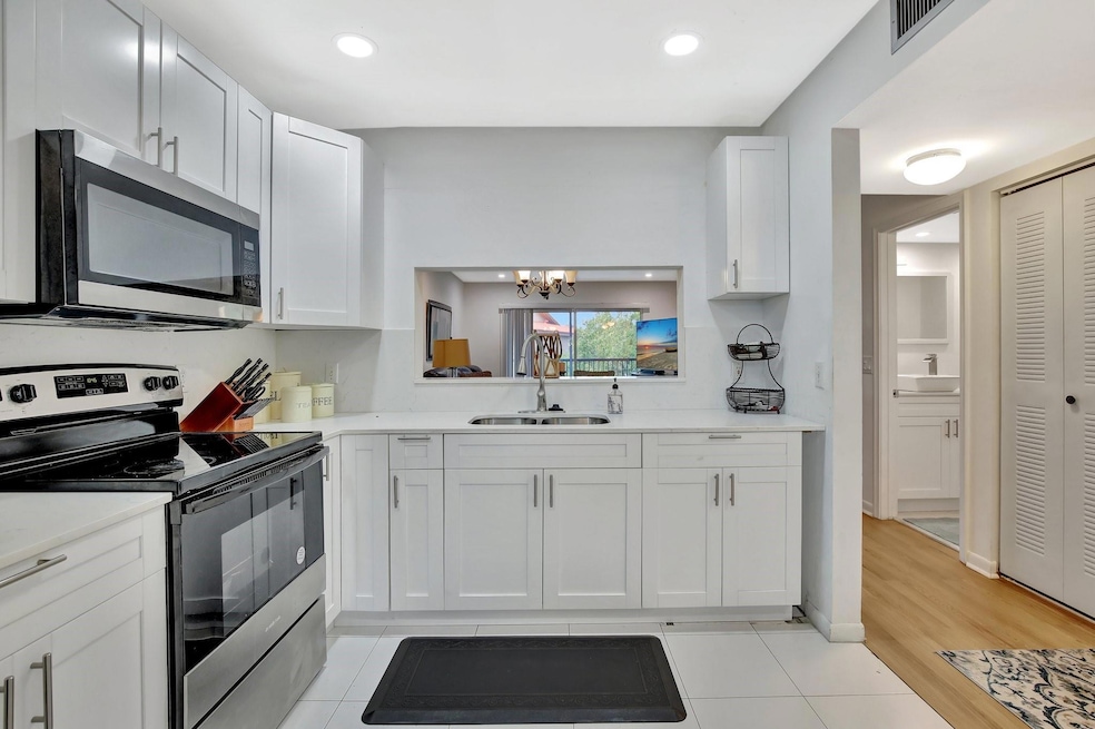 1200 SW 124th Terrace unit 404O, Pembroke Pines, FL 33027 - photo 1