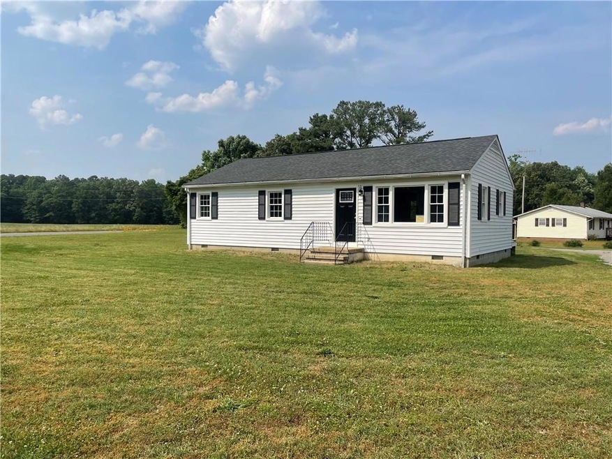 1607 Wares Wharf Rd, Dunnsville, VA 22454 - photo 1