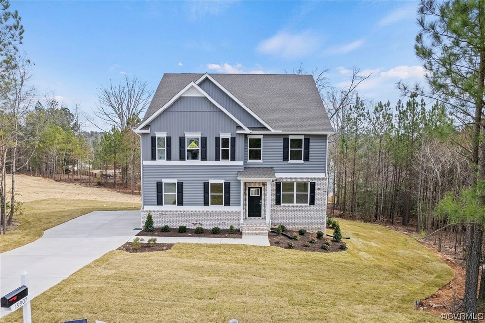 View of front of house featuring a front lawn
