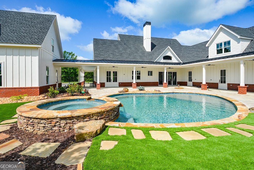 Amazing NEW Farmhouse on 145 Acres in Waleska