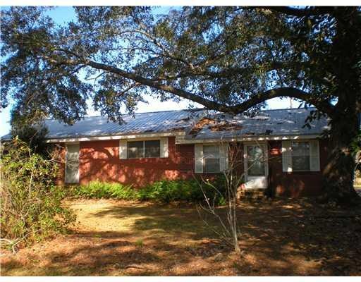 Photo. Red Brick cottage on two acres of cleared l
