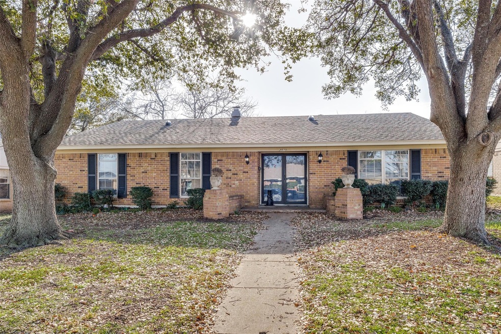 Single story home featuring a front yard