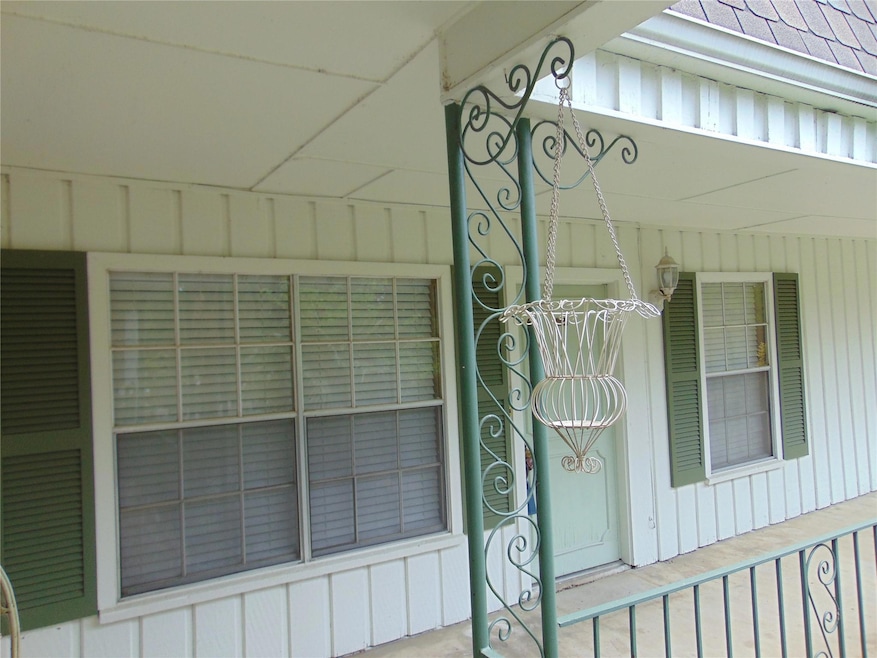 Entrance to property with board and batten siding