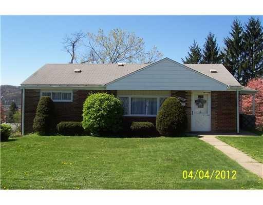 Exterior Front. All Brick Home with Well Manicured