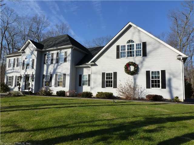 Exterior Front. Spacious Colonial beautifully land