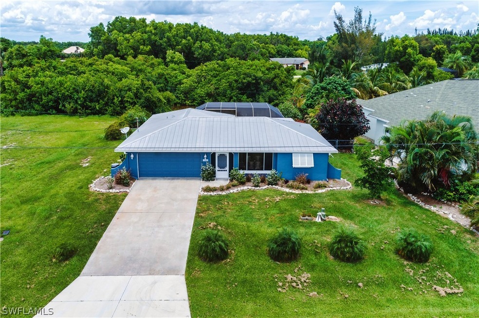 5660 Saint Marie Ln, Bokeelia, FL 33922 - photo 1