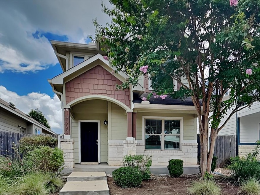 View of front of house featuring stone siding