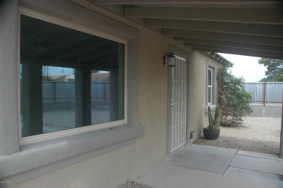 Front door and large picture window.
