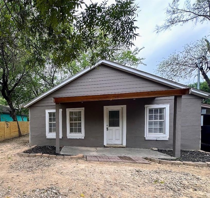 View of front of home with fence
