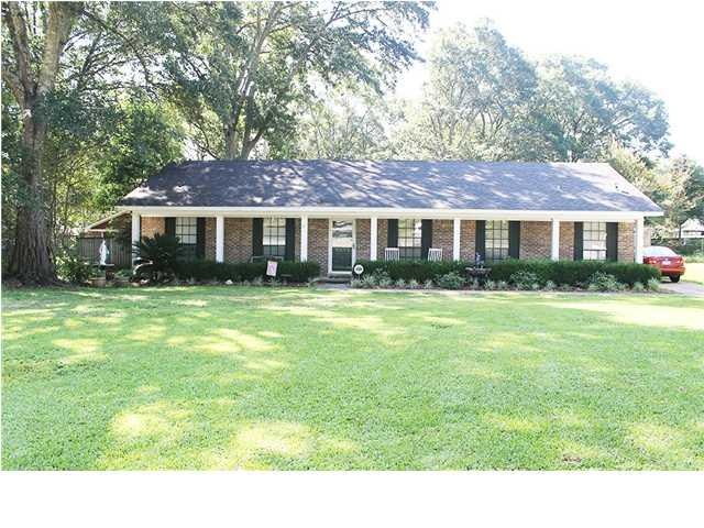 This wonderful low maintenance brick family home i