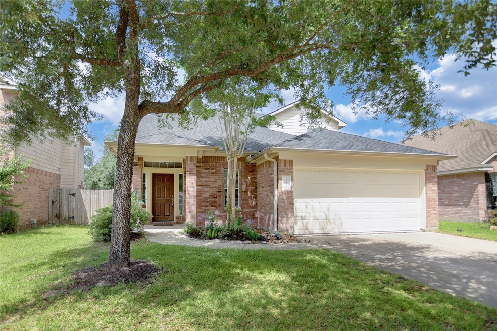 31727 Royal Woods Ct, Conroe, TX 77385 - photo 1