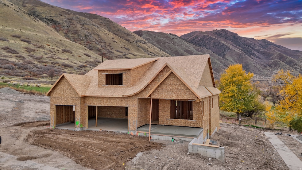 View of front of house with a mountain view