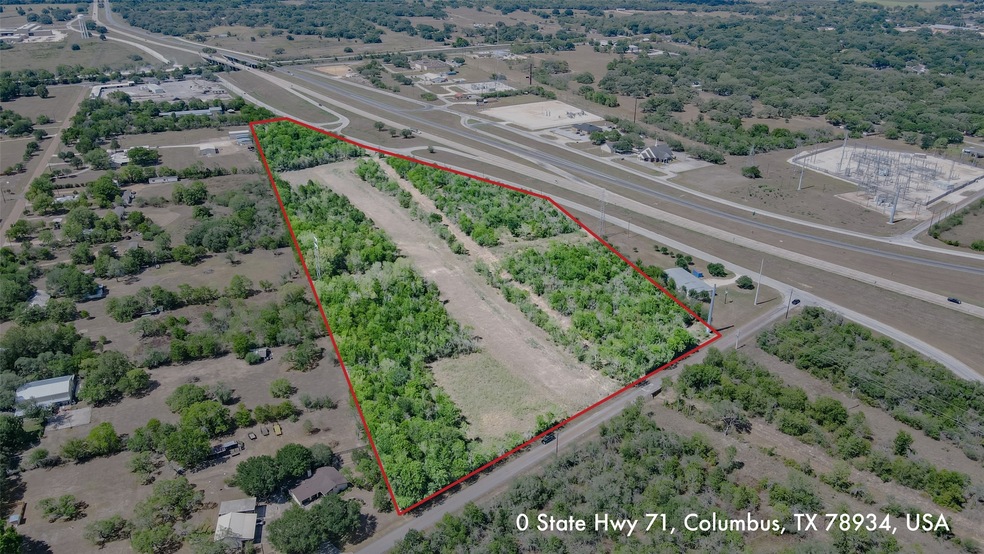 Aerial view of property with access to I-10 and Hw