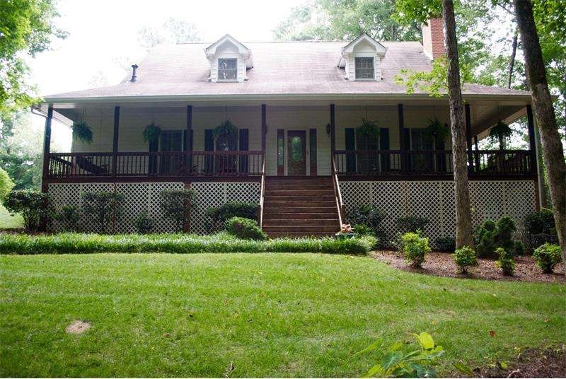 FRONT ENTRY WITH WRAP AROUND PORCH